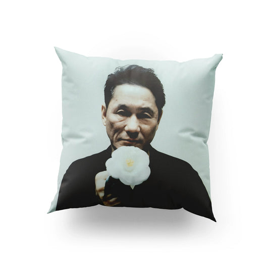 Decorative pillow featuring Takeshi Kitano film-inspired artwork for indoor use.